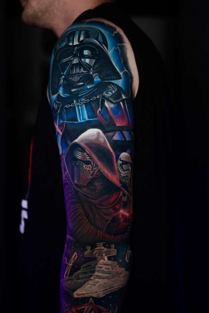 Dark illustrative character sleeve tattoo by Jonathan Cataño
